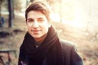 Young smiling man outdoor portrait